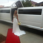 White Hummer Wedding Limousine Perth with dedicated bridal door middle opening jet door